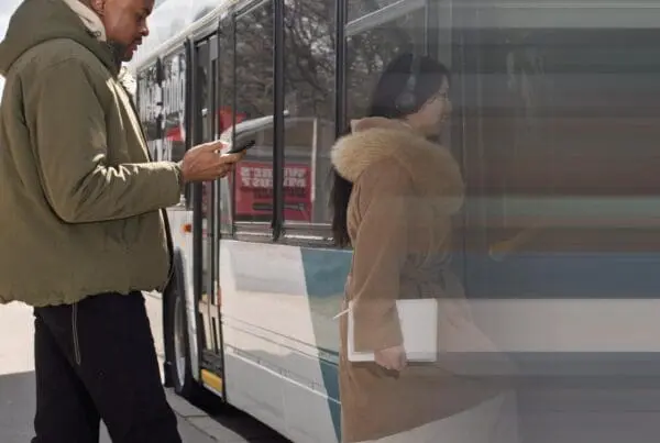 People boarding a bus.